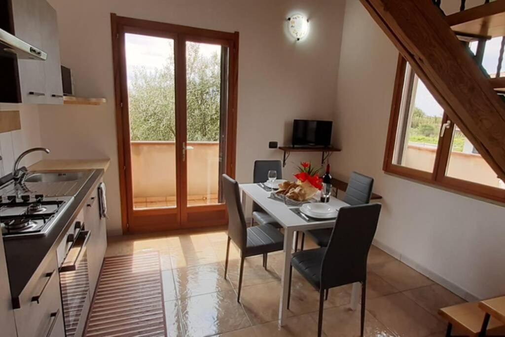 Casa Cao Appartamento "L'Ulivo" Nurachi Bagian luar foto